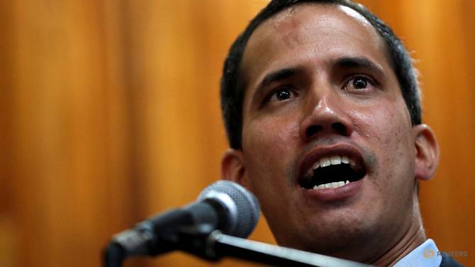 Venezuelan opposition leader Juan Guaido attends a meeting with representatives of FEDEAGRO in Cara