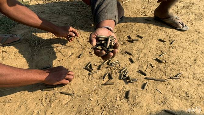 residents-of-rathedaung-township-in-myanmar-s-restive-rakhine-state-show-bullet-shells-in-an-area-where-soldiers-battled-arakan-army-rebels-in-january-2019-1552933781316-3.jpg