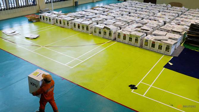 worker-prepares-election-materials-to-be-distributed-to-polling-stations-at-a-sports-hall-in-jakarta-1.jpg