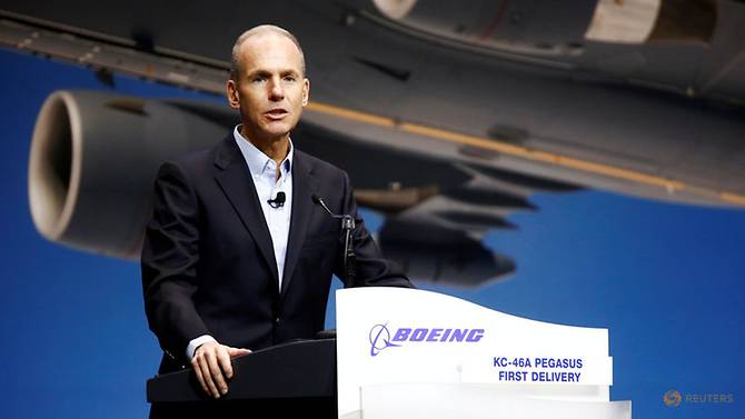 file-photo--boeing-chairman--president-and-ceo-muilenburg-speaks-during-a-delivery-celebration-of-the-boeing-kc-46-pegasus-aerial-refueling-tanker-to-the-u-s--air-force-in-everett--washington-1.jpg