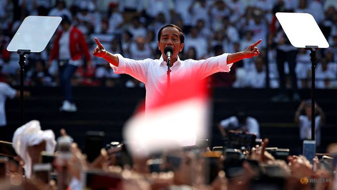 file-photo--indonesia-s-incumbent-presidential-candidate-joko-widodo-gestures-as-he-speaks-during-a-campaign-rally-at-gelora-bung-karno-stadium-in-jakarta-1.jpg