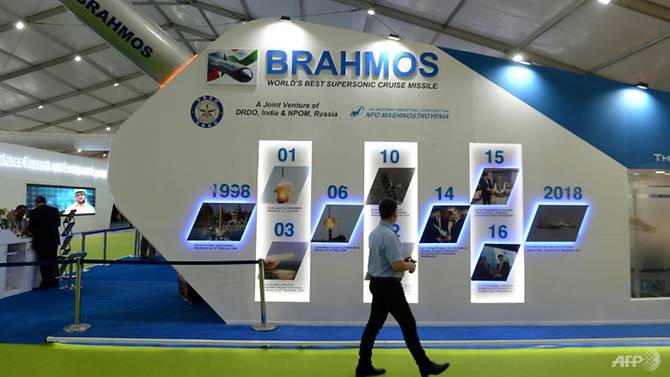 a-man-walks-past-a-display-for-the-brahmos-missile-at-defexpo-2018-in-chennai--india-wants-to-soon-start-selling-the-missile-to-other-countries-1558532592705-7.jpg