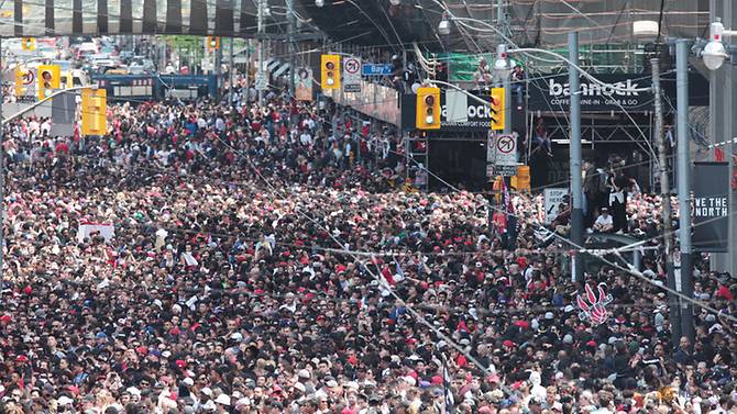 toronto-fans-fill-the-streets-in-front-of-the-city-hall-during-the-toronto-raptors-nba-championship-celebration-parade-at-nathan-phillips-square-in-toronto-2.jpg