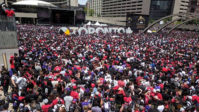 toronto-fans-gather-in-front-of-the-city-hall-during-the-toronto-raptors-nba-championship-celebration-parade-at-nathan-phillips-square-in-toronto-3.jpg