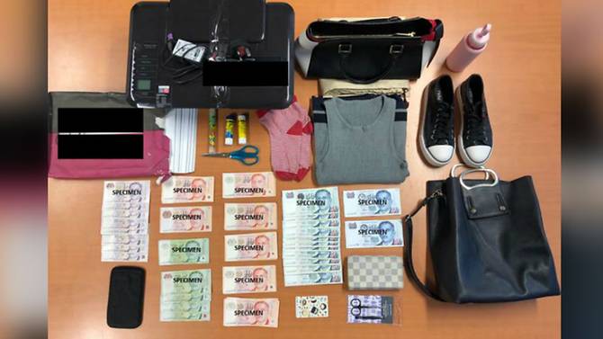 fake-s-50-currency-notes--a-printer-and-handbags-among-items-seized-by-police-on-jun-23--2019.jpg