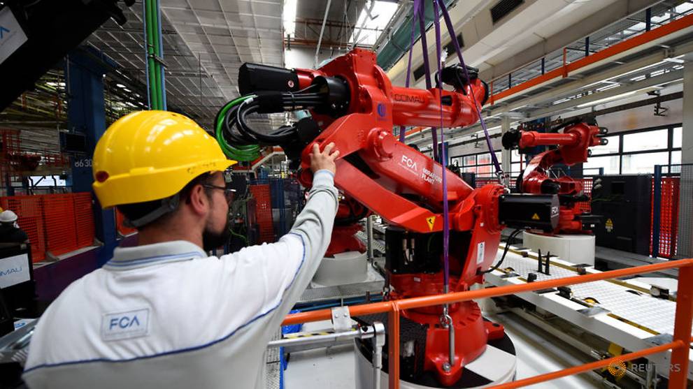 Ceremony to mark the installation of the first robot on the production line for the new electric fiat 500 bev at the mirafiori industrial complex on the 80th birthday of the plant 1