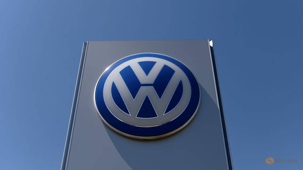 File photo  the logo of volkswagen is seen in front of its plant  in bratislava 1