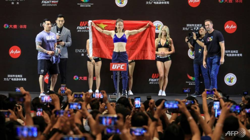 Zhang wins China's first UFC title in stunning style - CNA