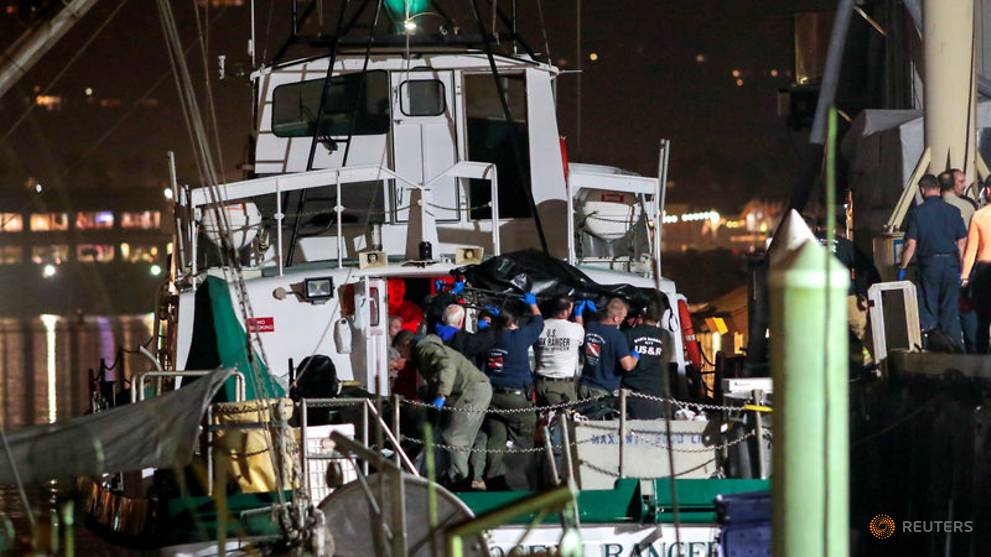Divers recover bodies of all but one of 34 victims of California boat blaze