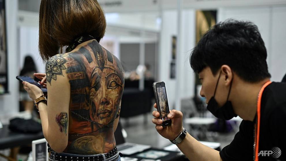Malaysia Slams Tattoo Expo As Porn Over Half-Naked Pics - Cna-8983