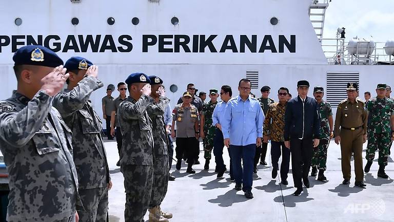 indonesia-s-president-joko-widodo-walking-with-officials.jpg