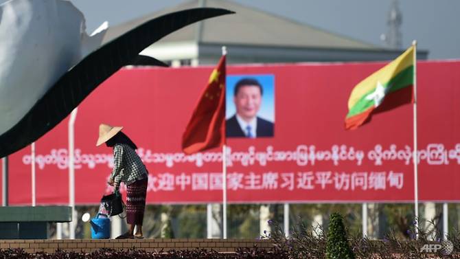 Billboards and banners welcomed China's Xi Jinping to Naypyidaw on Friday