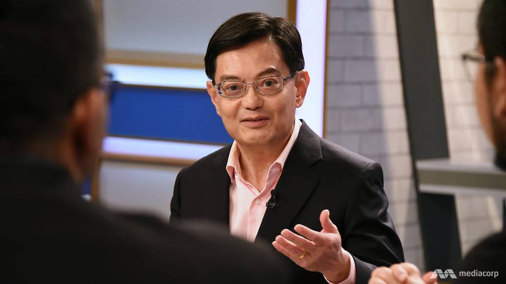 COVID-19: Singapore to waive foreign worker levy, enhance ...