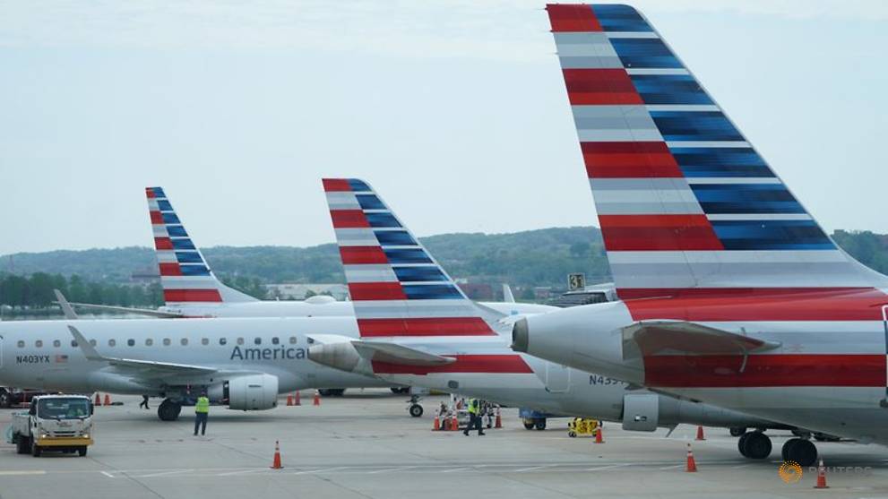https://cna-sg-res.cloudinary.com/image/upload/q_auto,f_auto/image/12781838/16x9/991/557/8a44501f559f15f1e9f9d5423beb0cf8/Im/american-airlines-jets-sit-at-gates-at-washington-s-reagan-national-airport-in-washington-1.jpg