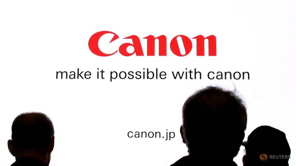 Canon Reports First Ever Quarterly Loss Cuts Dividend Cna