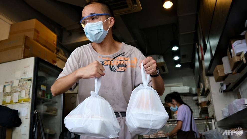 After COVID-19 dining ban, takeaway waste clogs Hong Kong's pavements, parks and waterways