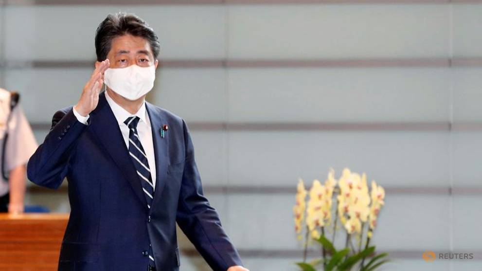 Former Japan PM Abe visits Yasukuni Shrine for war dead