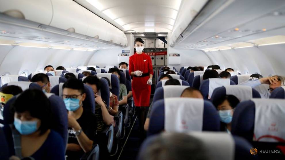 COVID-19 exposure risk on airplanes very low, US defence study finds - CNA