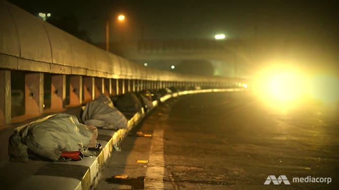 Indian migrant workers sleeping on pavements during their interstate journey back to their hometowns