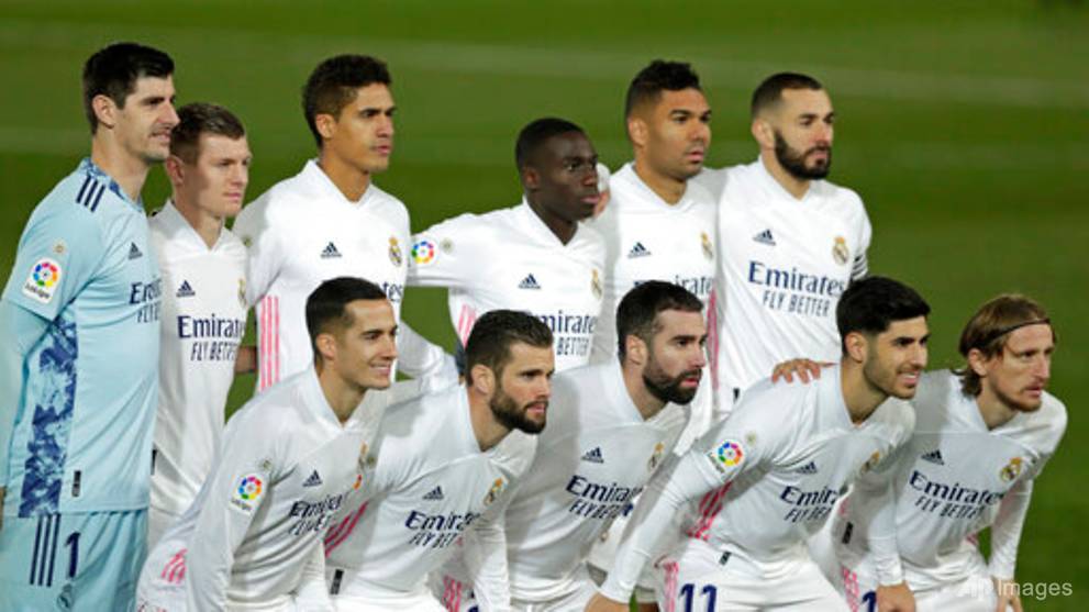 Spain's Real Madrid football team held up on icy runway as storm