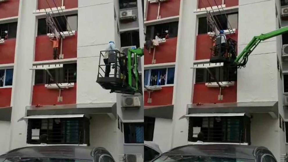 Child standing on window ledge of HDB flat in Hougang rescued by worker ...