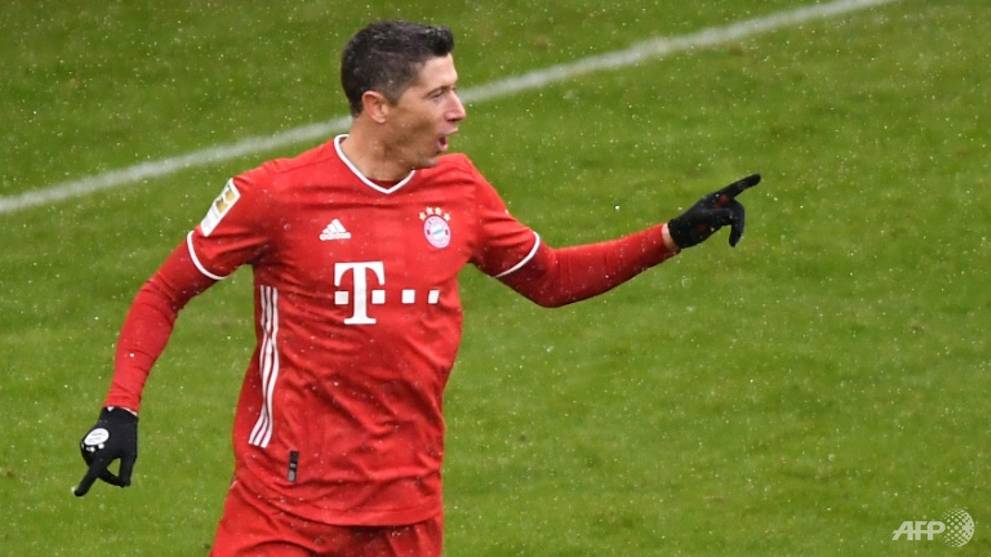 Football: Lewandowski scores record 21st league goal in ...