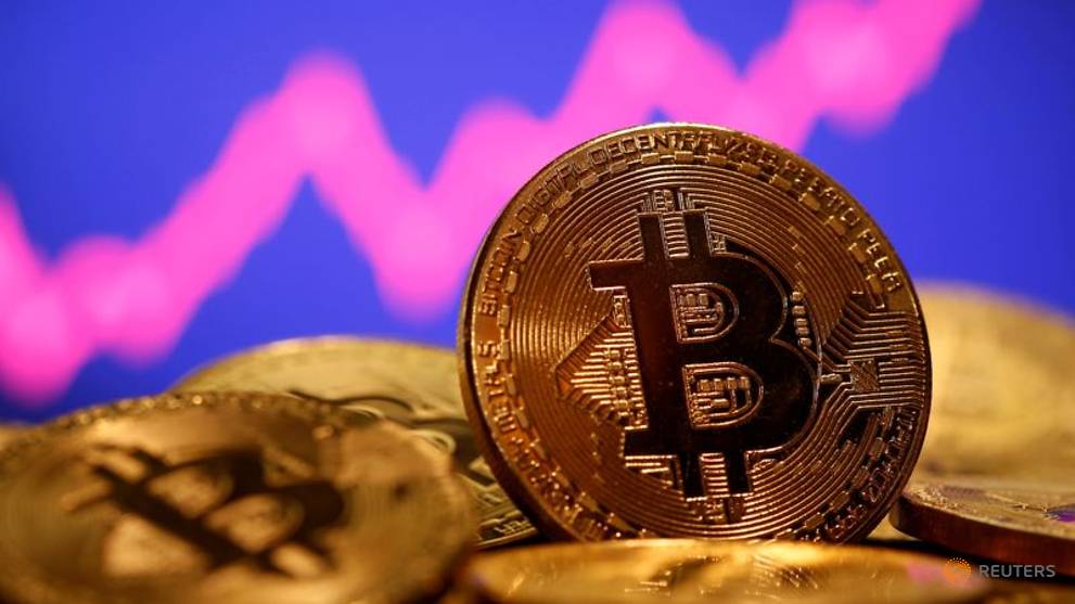 Bitcoin breaks US$44,000 on Tesla investment news - CNA