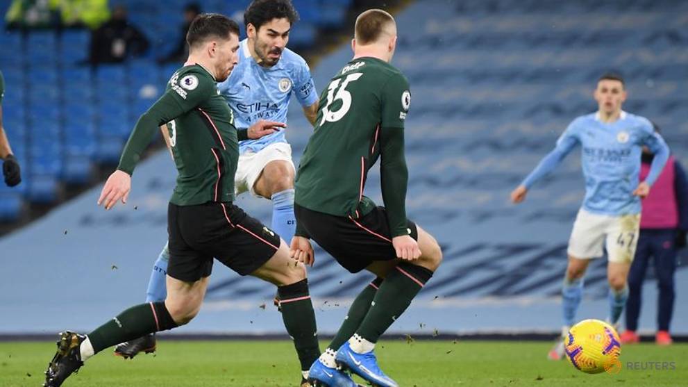 Football: Gundogan strikes again as Man City sink Spurs - CNA