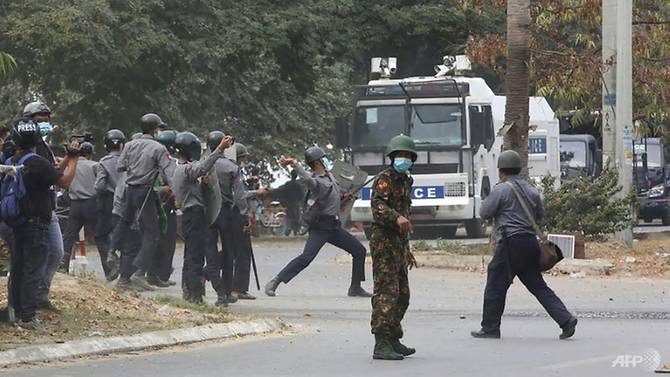 police-throw-projectiles-towards-protest