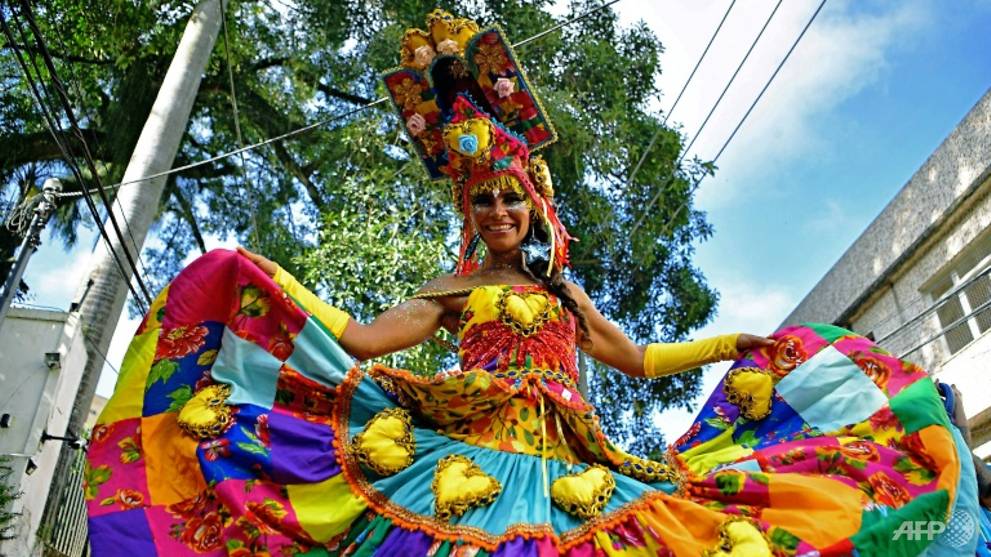 Brazil carnival artist rises above COVID-19 pandemic - on stilts - Vimarsana News