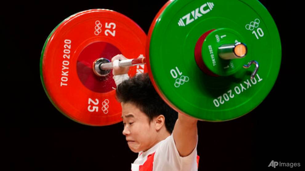 China's Hou Zhihui wins first weightlifting gold of Tokyo ...