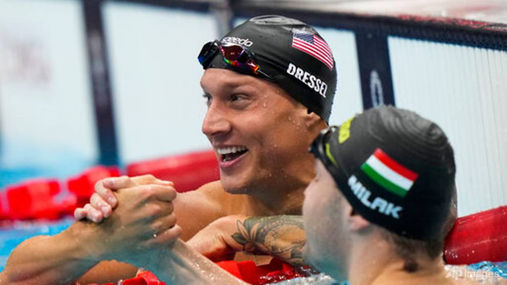 Swimming: Caeleb Dressel Dressel shatters world record to ...