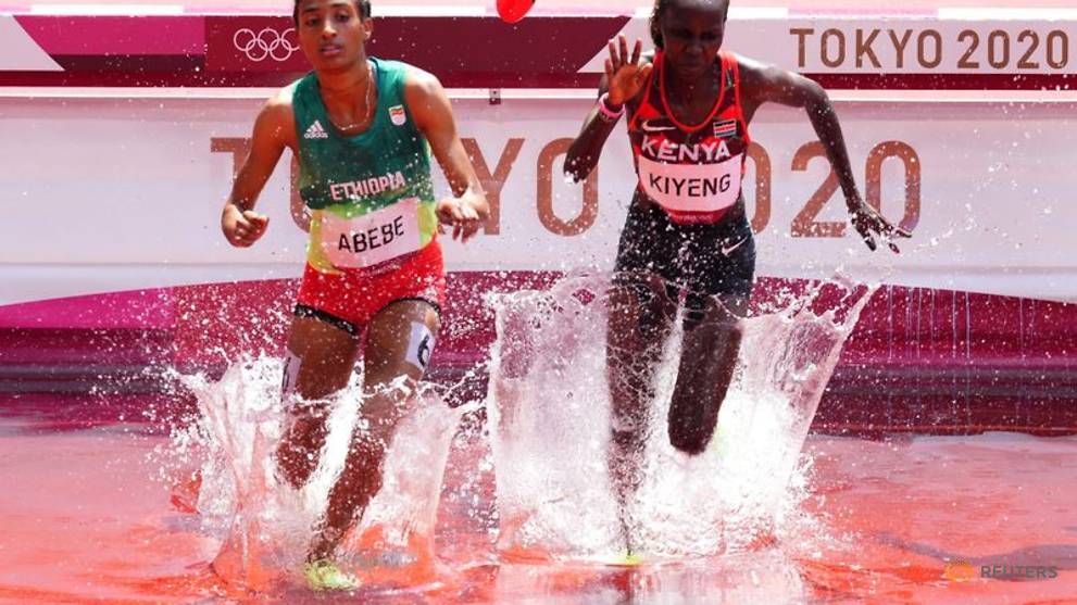 Olympics-Athletics-Amidst punishing temperatures, women's ...