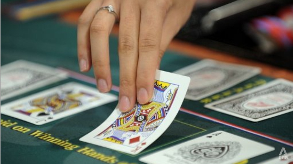 Jail and fine for trio who set up online poker club using mobile app - CNA